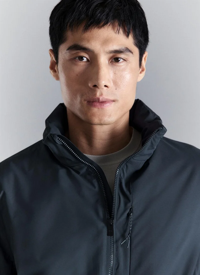 مانجو مان Packable water-repellent jacket with Thermore technology